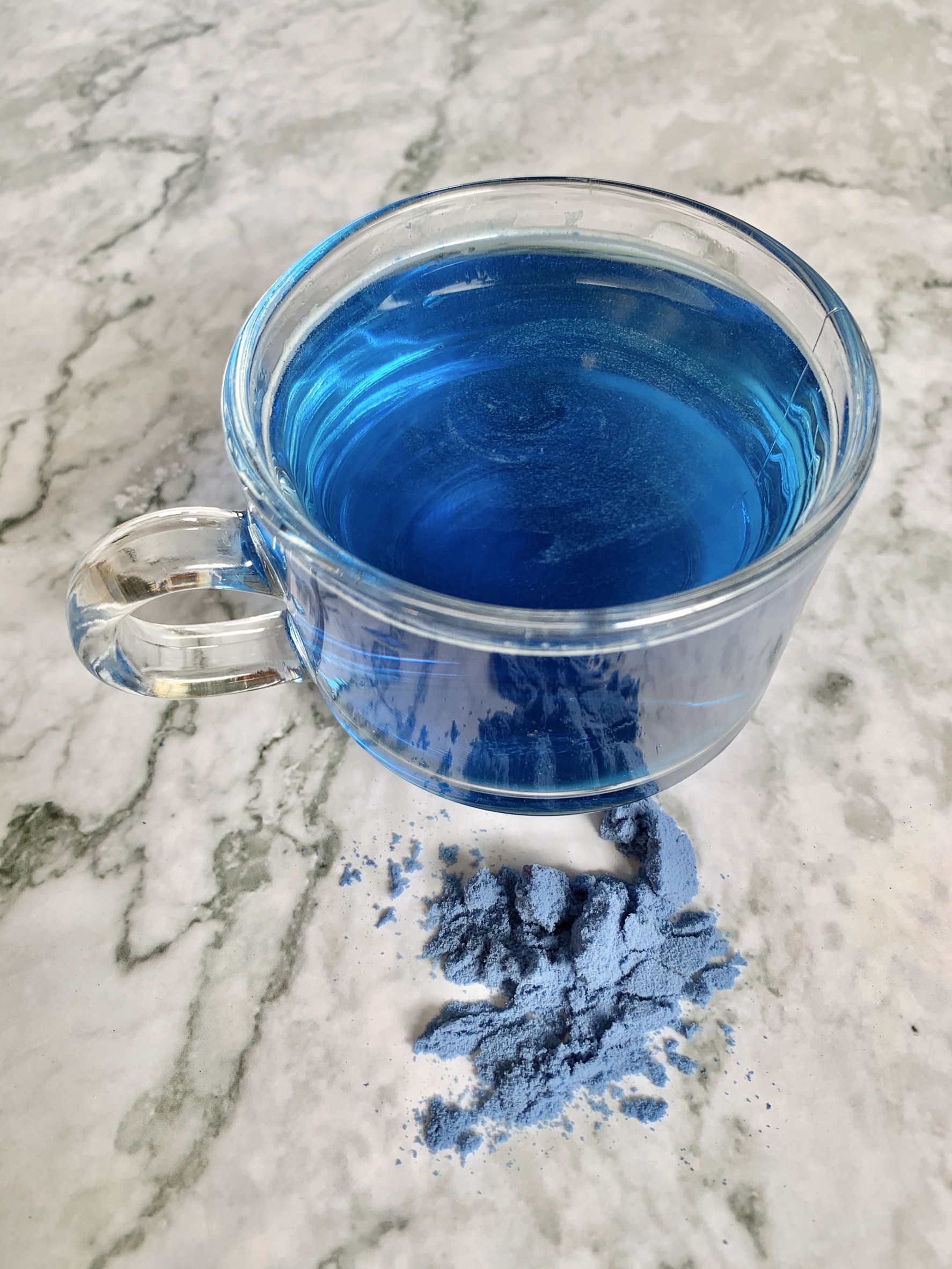 ผงดอกอัญชัน ขนาด 100 กรัม ผงอัญชันสกัดเข้มข้น ผงชาอัญชัน (Blue Butterfly Pea Extract) ไม่ใส่นม ไม่มีน้ำตาล ละลายได้ในน้ำอุ่นและน้ำเย็น ไม่มีตะกอนตกค้าง ผงอัญชันเหมาะสำหรับทำเครื่องดื่ม และเบเกอรี่ Dried Blue Butterfly Pea Powder For Beverages and Bakery.