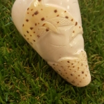 เปลือกหอยเต้าปูนแกะสลักลายโลมาคู่